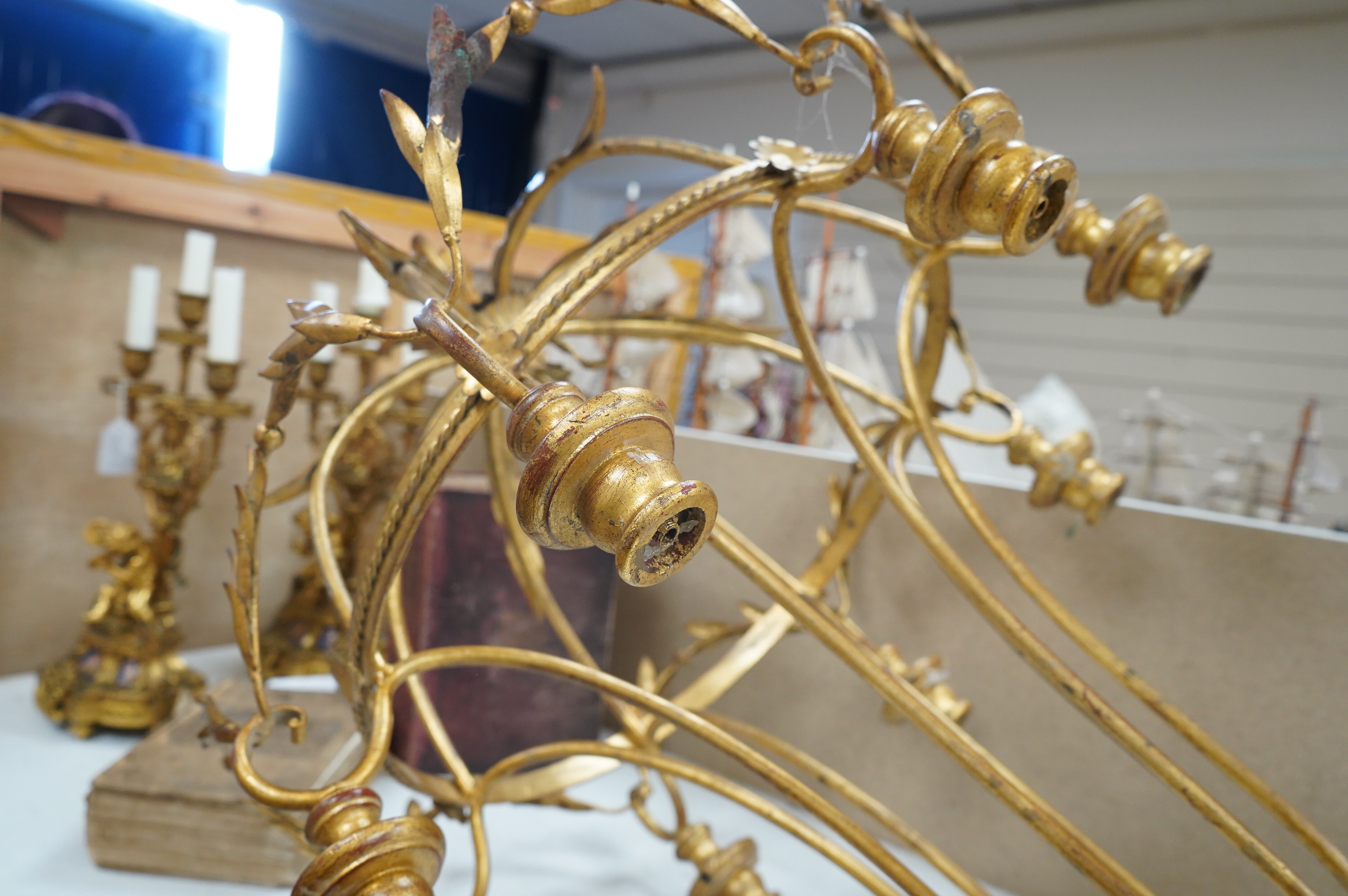 A gilt metal eight light basket chandelier, 86cm